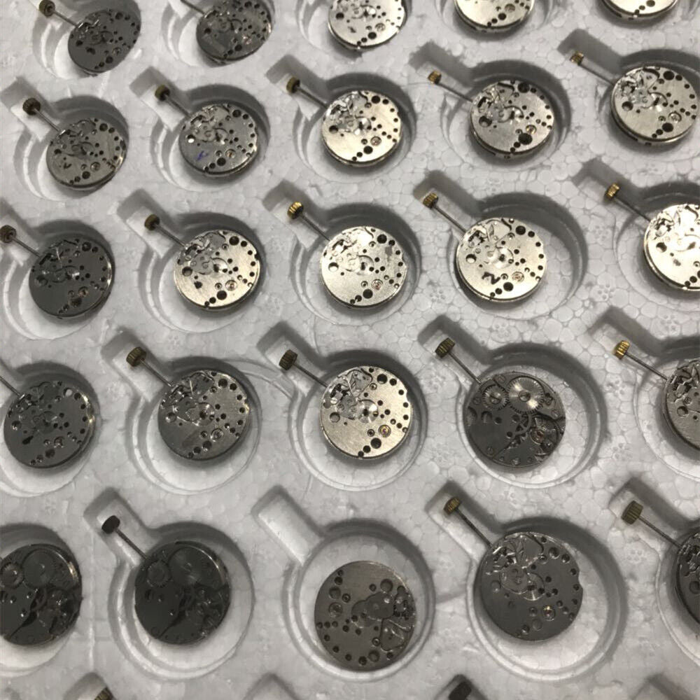 1. Close-up of 5x 7121 3121 automatic mechanical watch movements for repair practice, China made.  