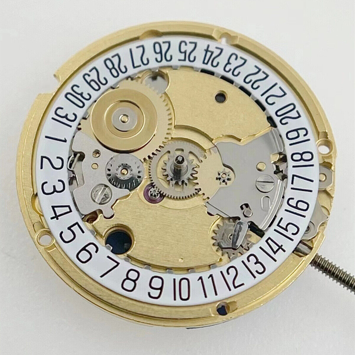 ETA 956.112 Swiss quartz watch movement with three hands and date at 6, precise timekeeping.