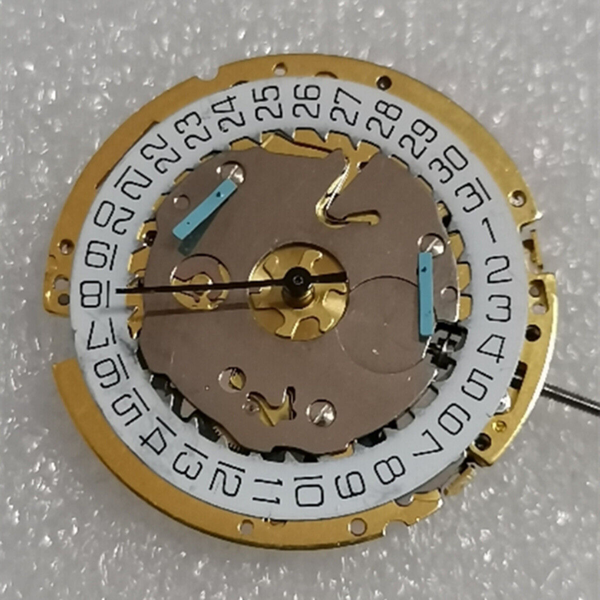 Watchmakers ISA 8171 golden quartz movement with date at 3 and multi-function for repairs