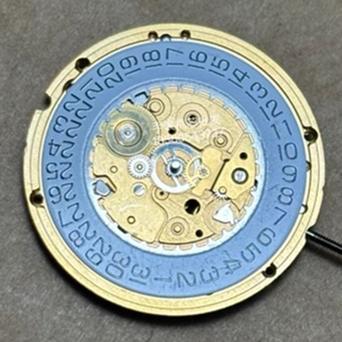 1. ETA 255.411 quartz watch movement with 2/3 hands for precise timekeeping by ETA.  