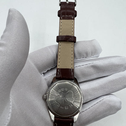 HONGLIAN 32mm manual mechanical watch with 17 jewels and Roman numerals in elegant classic design.