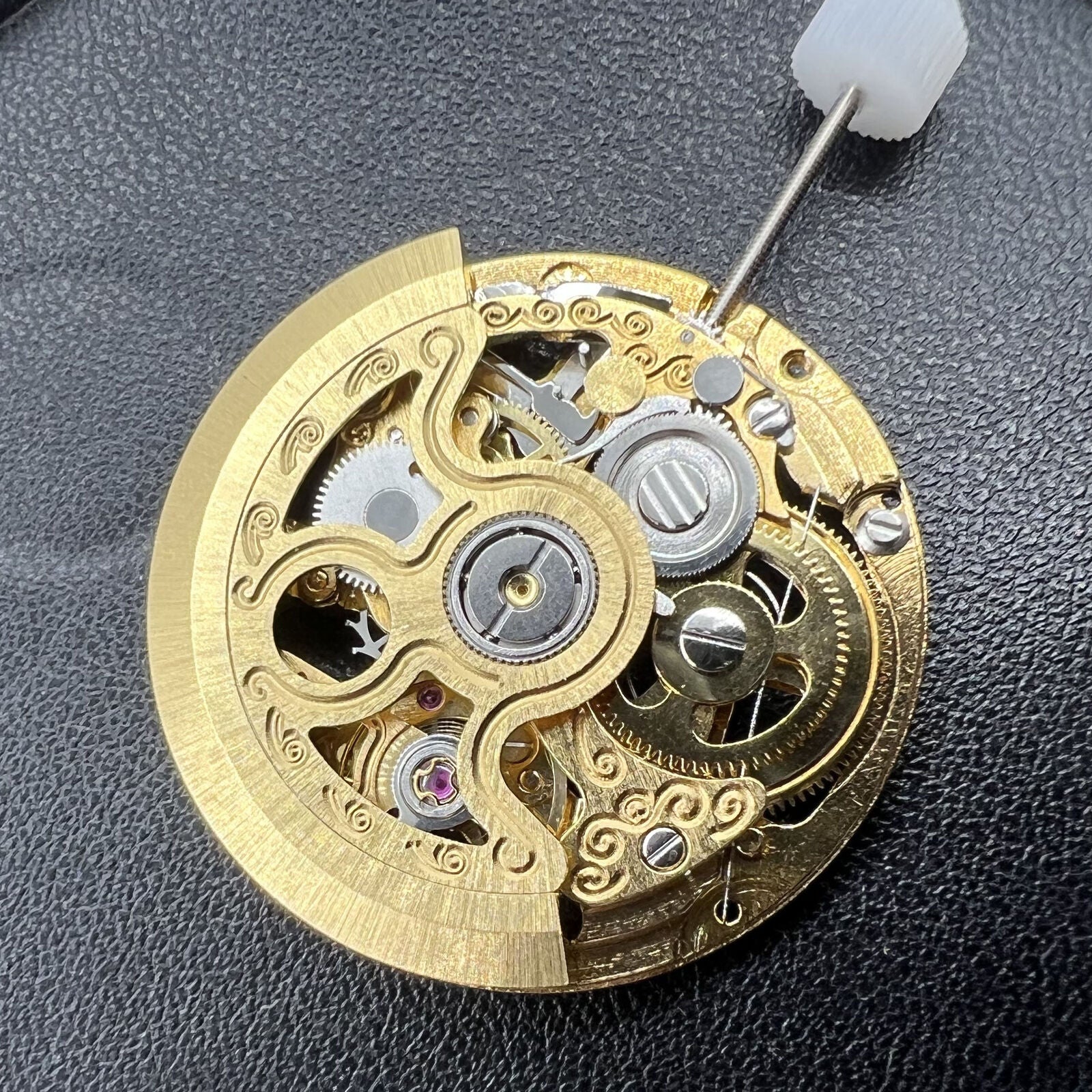 Hangzhou 2189 golden hollow automatic mechanical watch accessory showcasing intricate movement design.