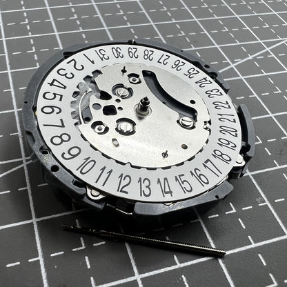 Japan Hattori VK64A quartz watch movement with date at 6 o'clock for precise timekeeping.