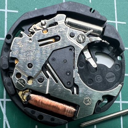 Hattori Epson VX12E quartz watch movement with date at 3 o'clock, precise timekeeping accessory