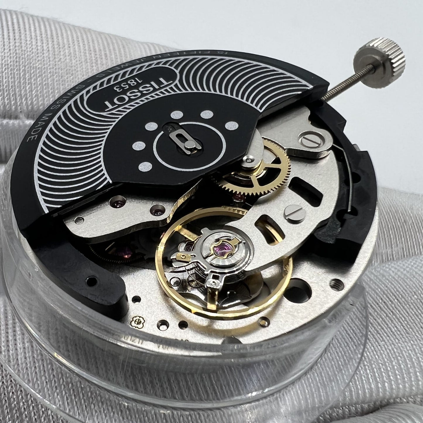 Swiss Made ETA C01.211 chronograph movement with black dial from 1853 brand, precision mechanical watch component.