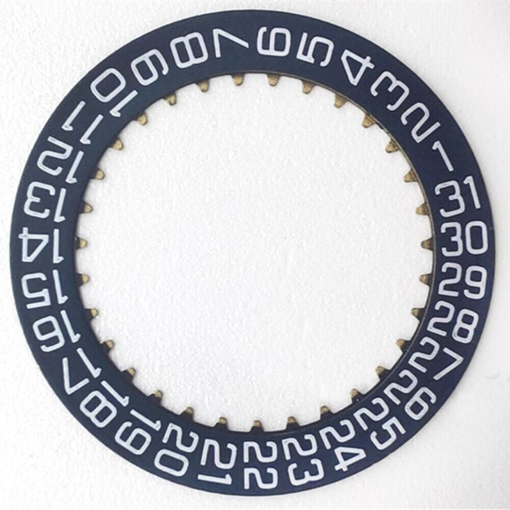 Dark blue and white date wheel for Dandong 7770 watch, date display at 3 o'clock position.