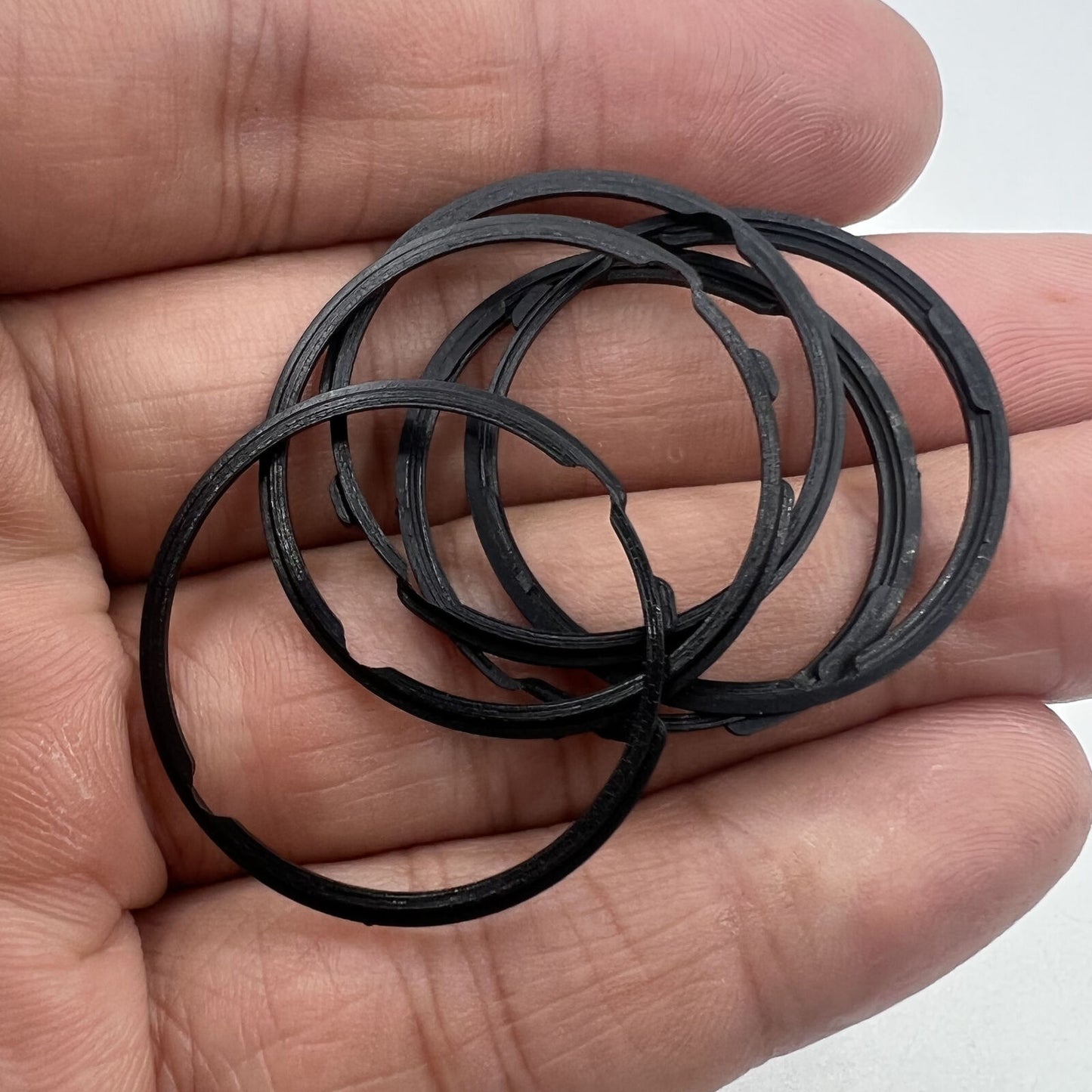 Black cushion mount spacer ring for Orient 46941 watch movement, ensuring secure dial fit.