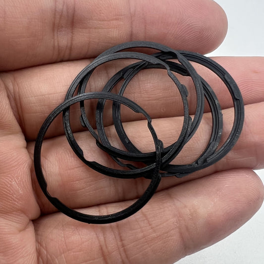 Black cushion mount spacer ring for Orient 46941 watch movement, ensuring secure dial fit.