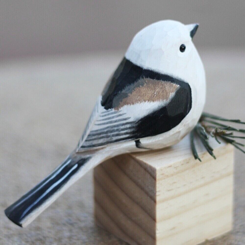Handmade Long-tailed Tit wooden figurine, detailed decorative bird sculpture for home decor.