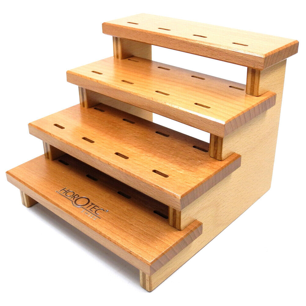 Swiss Horotec wooden storage rack with 12 tweezers for organized precision watch repair tools.