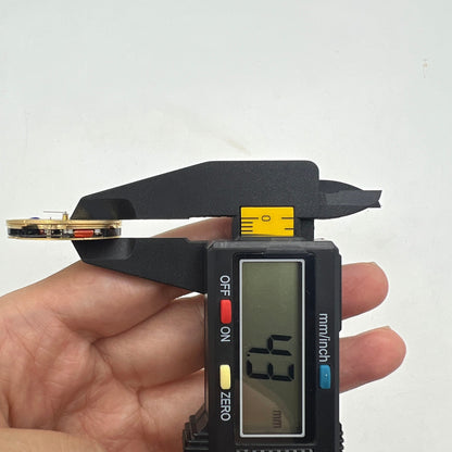 Swiss Made Ronda 5030D quartz watch movement with date display at 6 o'clock, precision watch accessory.