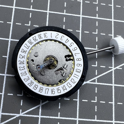 Ronda 585 Swiss quartz watch movement with date at 6 o'clock, precision timekeeping.