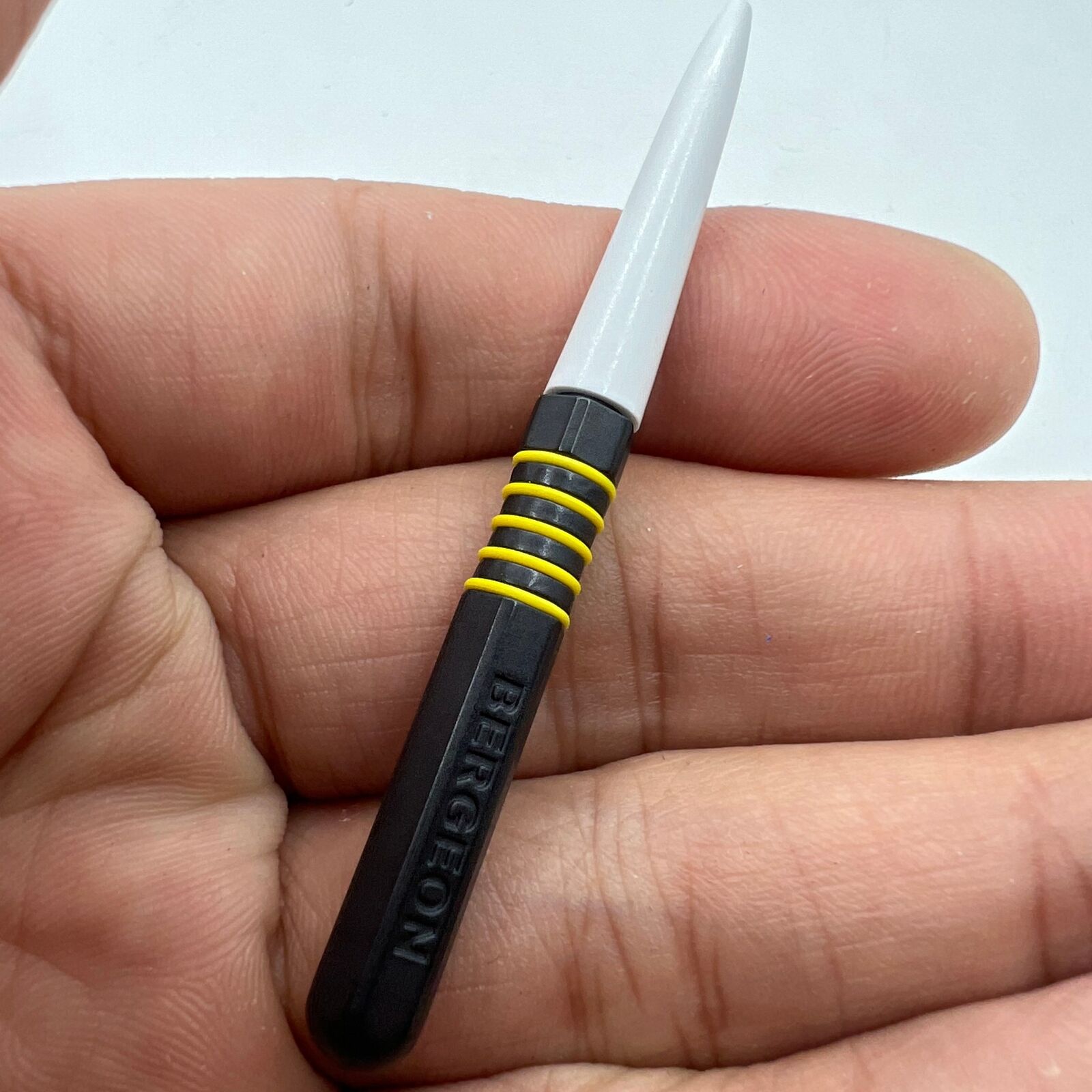 Bergeon 7013-J yellow metal dip oiler for precise watch oiling and grease application, ideal for watch repair.