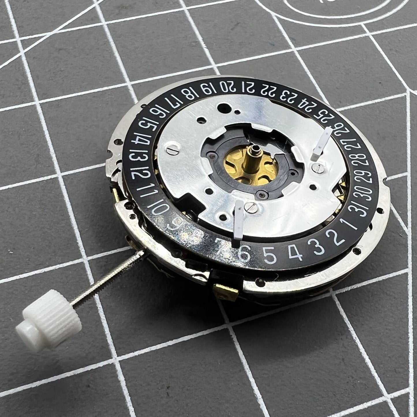 Golden ISA 8271 Date At 6 quartz watch with multifunctional dial, elegant gold-tone finish by ISA.