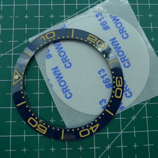 Großhandel 41,5 mm/32,5 mm Himmelblaue Lünette Gelbe Schrift Keramikuhr Lünetteneinsatz 