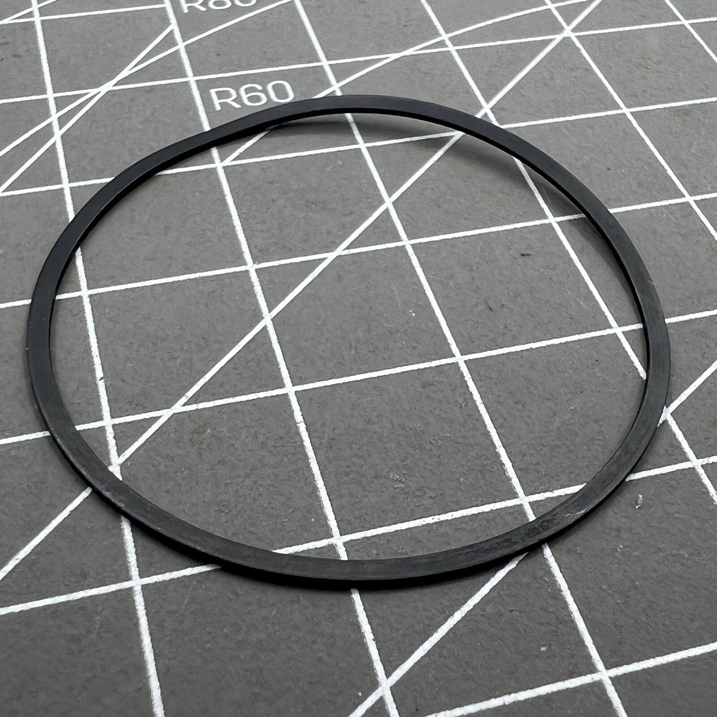 Citizen Eco-Drive H504 watch gasket O-ring sealing the quartz movement back case for water resistance.