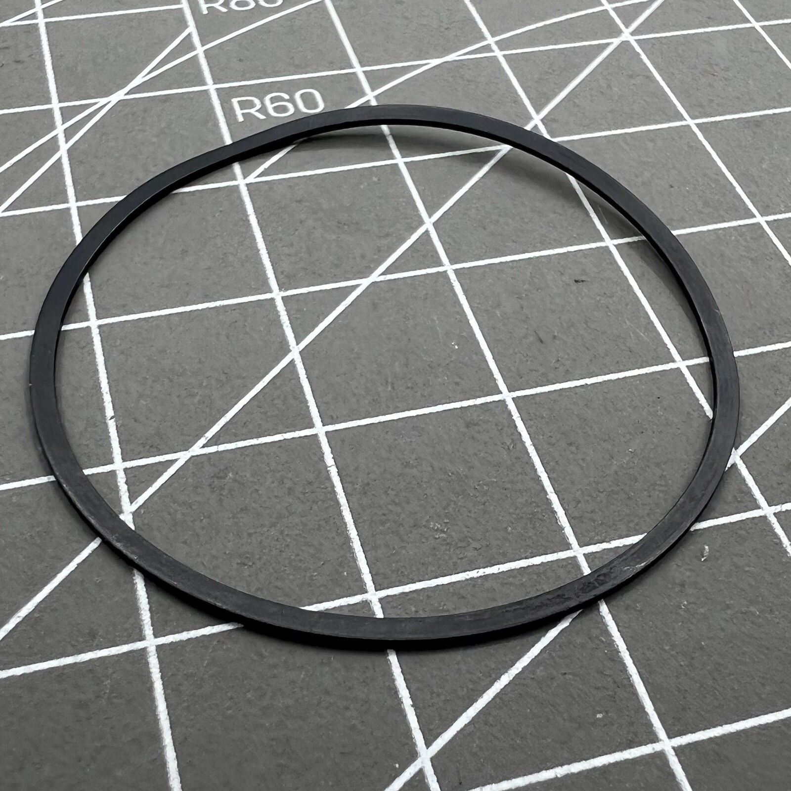 Citizen Eco-Drive H504 watch gasket O-ring sealing the quartz movement back case for water resistance.