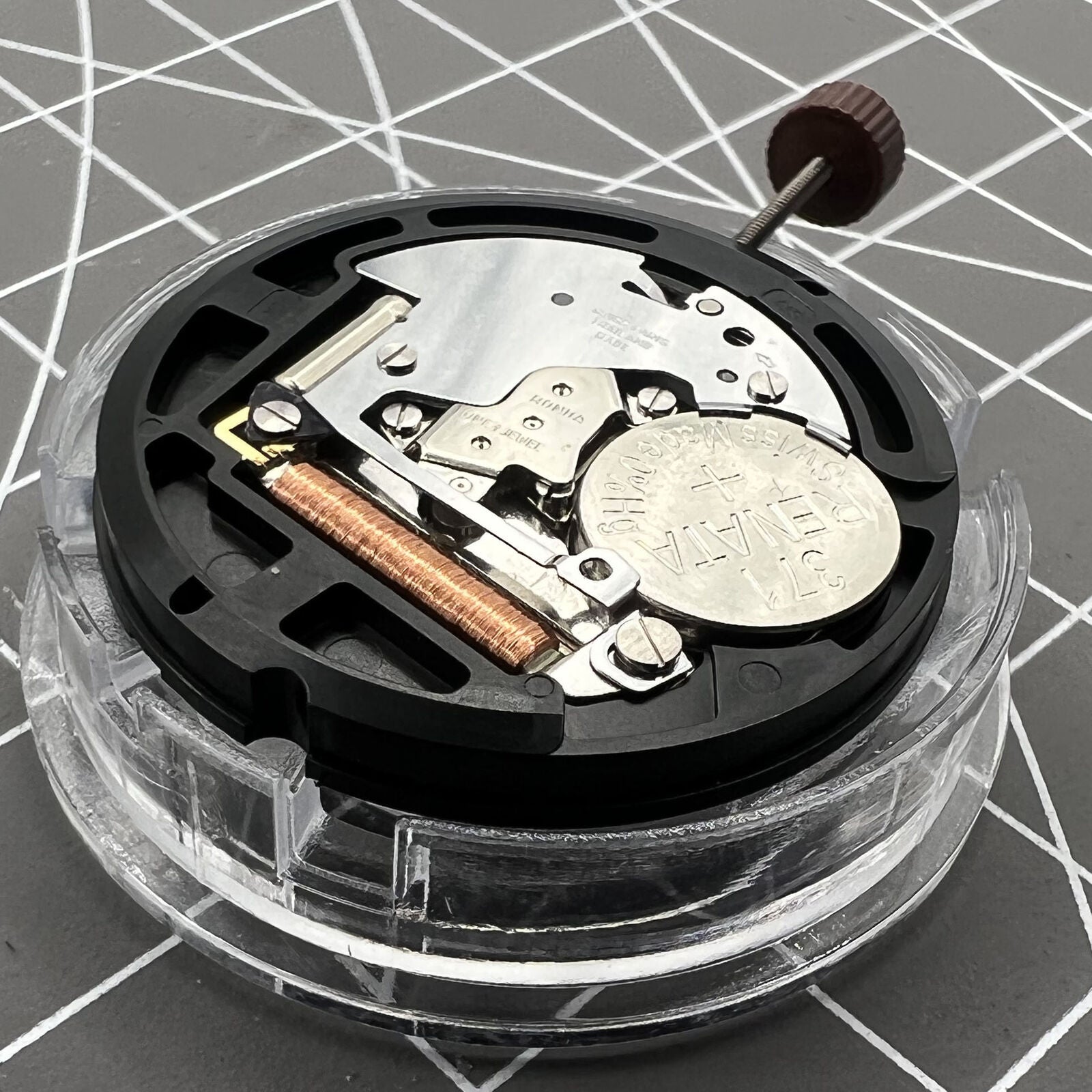 Swiss Ronda 509 quartz watch movement with black date disk at 3, ideal for precise watch accessories.