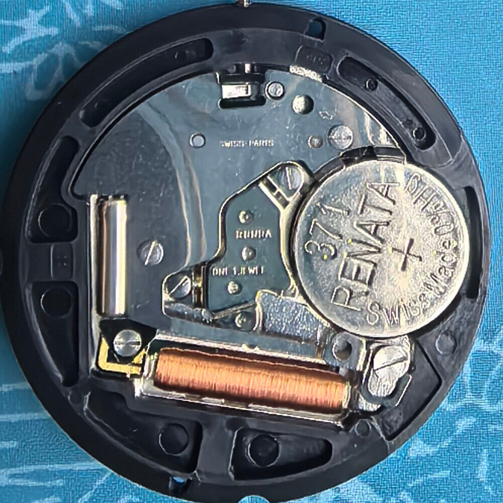 Swiss Made Ronda 519 quartz watch movement with white disk, ideal for precise timekeeping and replacements.