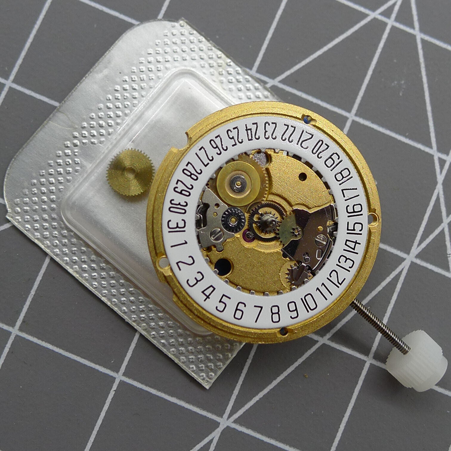 Swiss ETA 956.412 quartz watch movement with date at 6, 3 hands, precision Swiss-made ETA accessory.