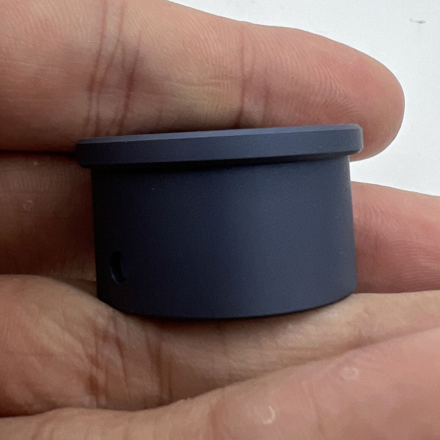 Bergeon 7100-11 1/2 watch movement holder gripping watch parts for accurate repair work.