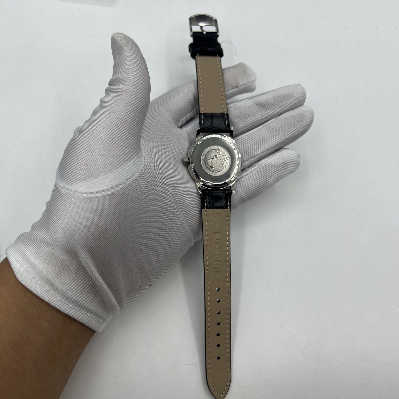 Beijing 36mm Double Rhomb manual watch with silver case, silver nail strap, classic elegant design by Beijing.