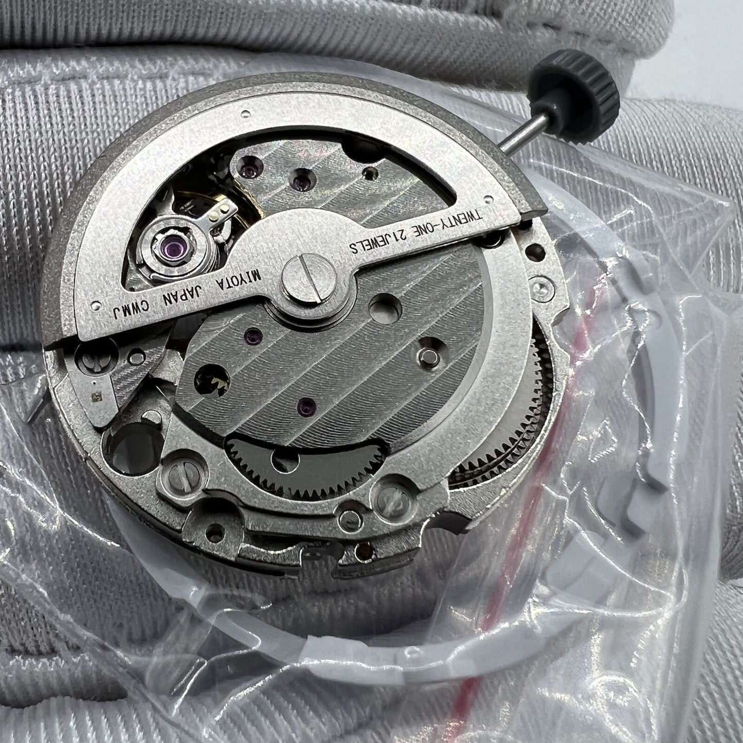 Miyota/Citizen 82S7 silver plated automatic watch movement, precision Japanese mechanical component for repairs.