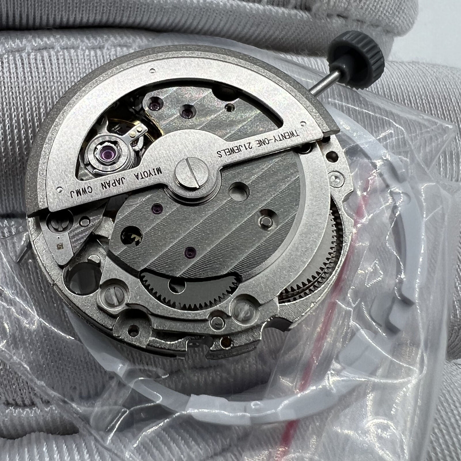 Miyota/Citizen 82S7 silver plated automatic watch movement, precision Japanese mechanical component for repairs.