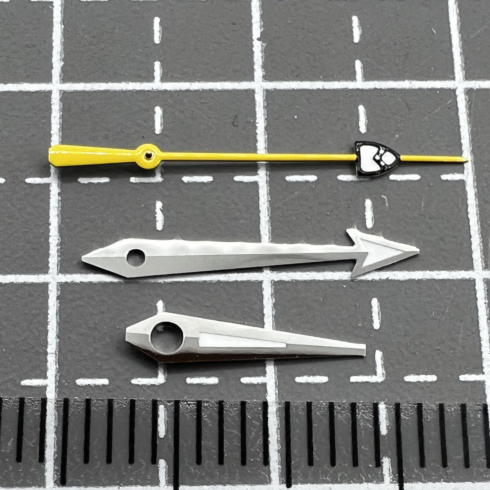 Yellow pointed second hand with green lume, compatible with NH35/36 watch movements.