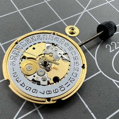 ETA 956.412 quartz watch movement with 3 hands and date display at 3 o'clock, precision timekeeping.