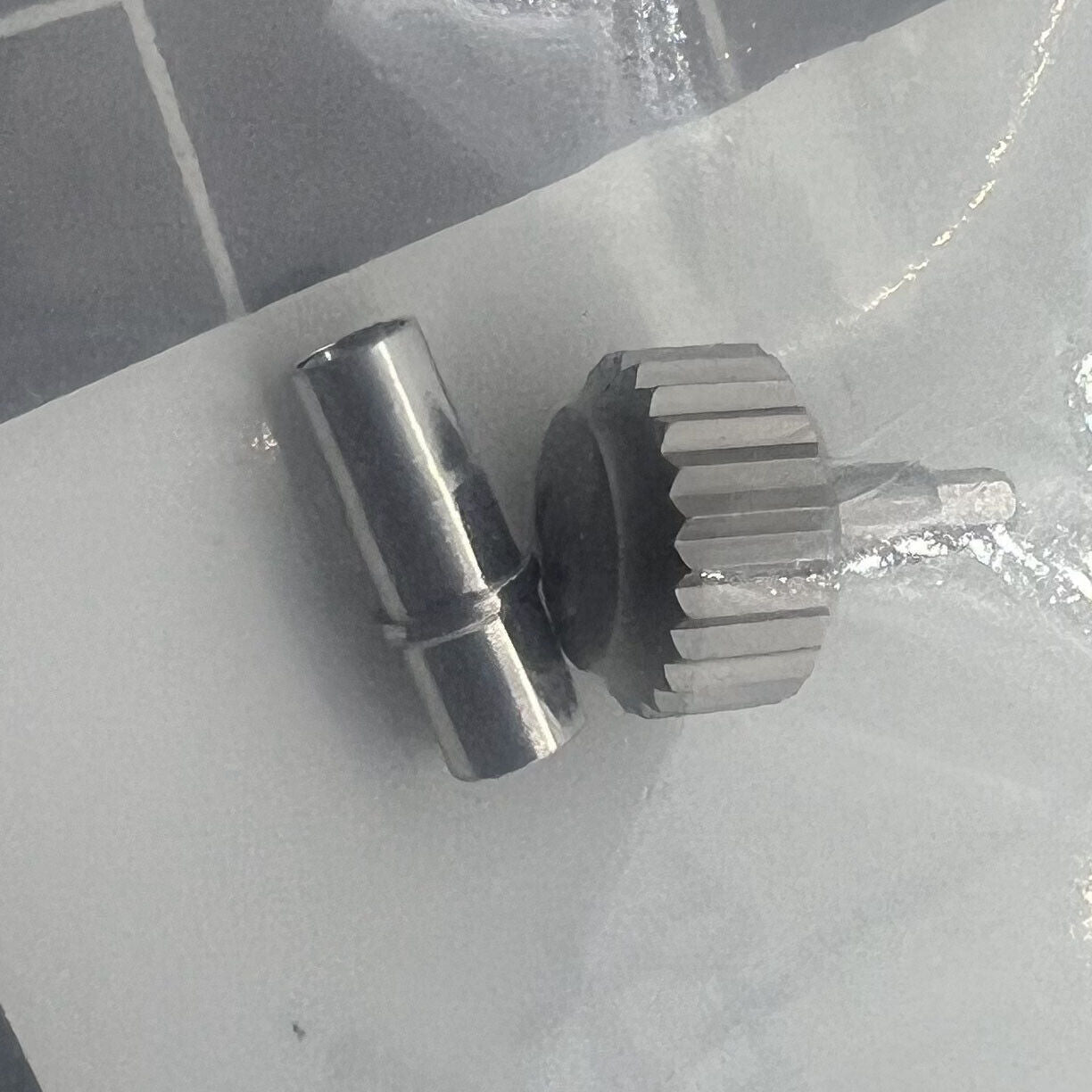 Titanium grey no-screw watch crown for Omega Seamaster 300 model 231.20, durable and sleek accessory.