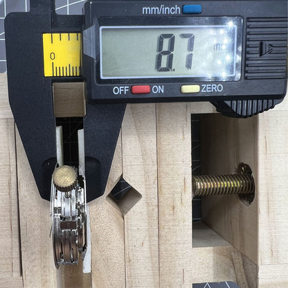 Close-up of 7750 mechanical watch movement with big date at 12 and small seconds subdial at 3, showcasing precision engineering.