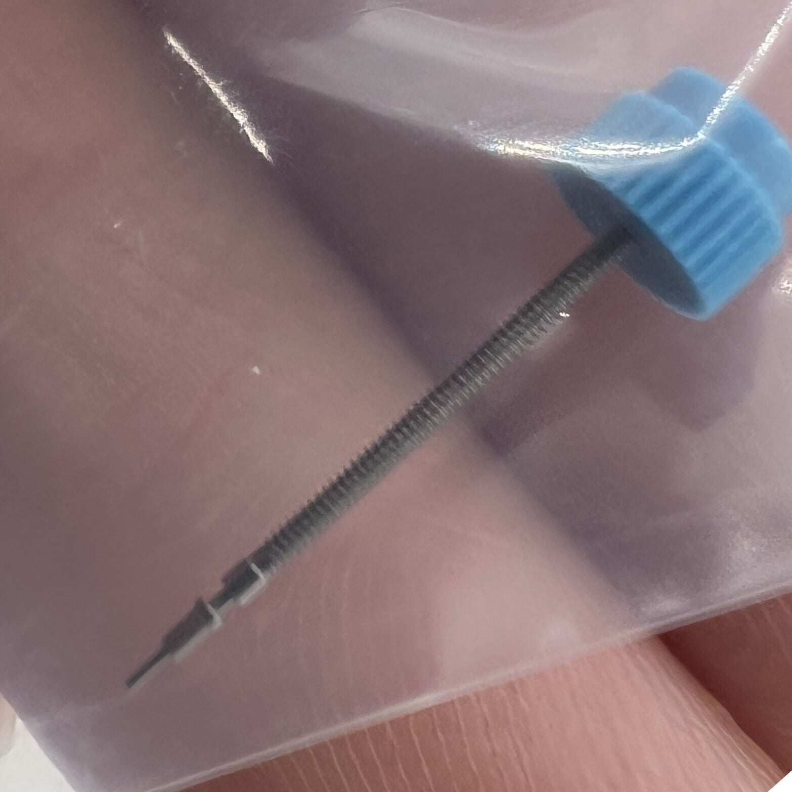 Original Swiss Made watch winding stem for ETA E03.001 movement, precision fit for repair.