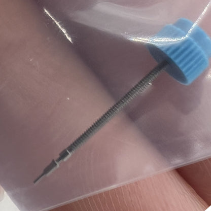 Original Swiss Made watch winding stem for ETA E03.001 movement, precision fit for repair.