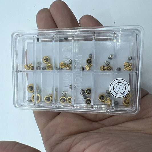 Set of 24 golden stainless steel watch crowns for screw-type models, perfect for repairs and replacements.