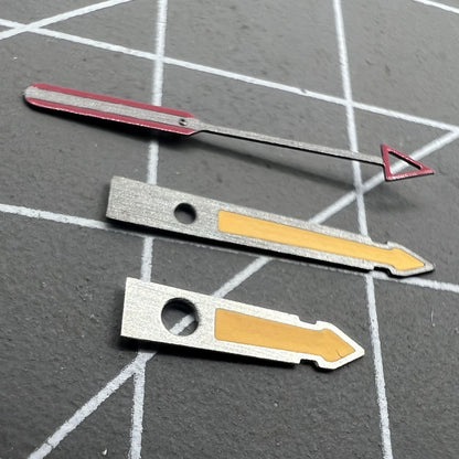 Arrow-shaped yellow luminous watch hands with black trim, compatible with NH35, NH36, 4R, and 7S movements.