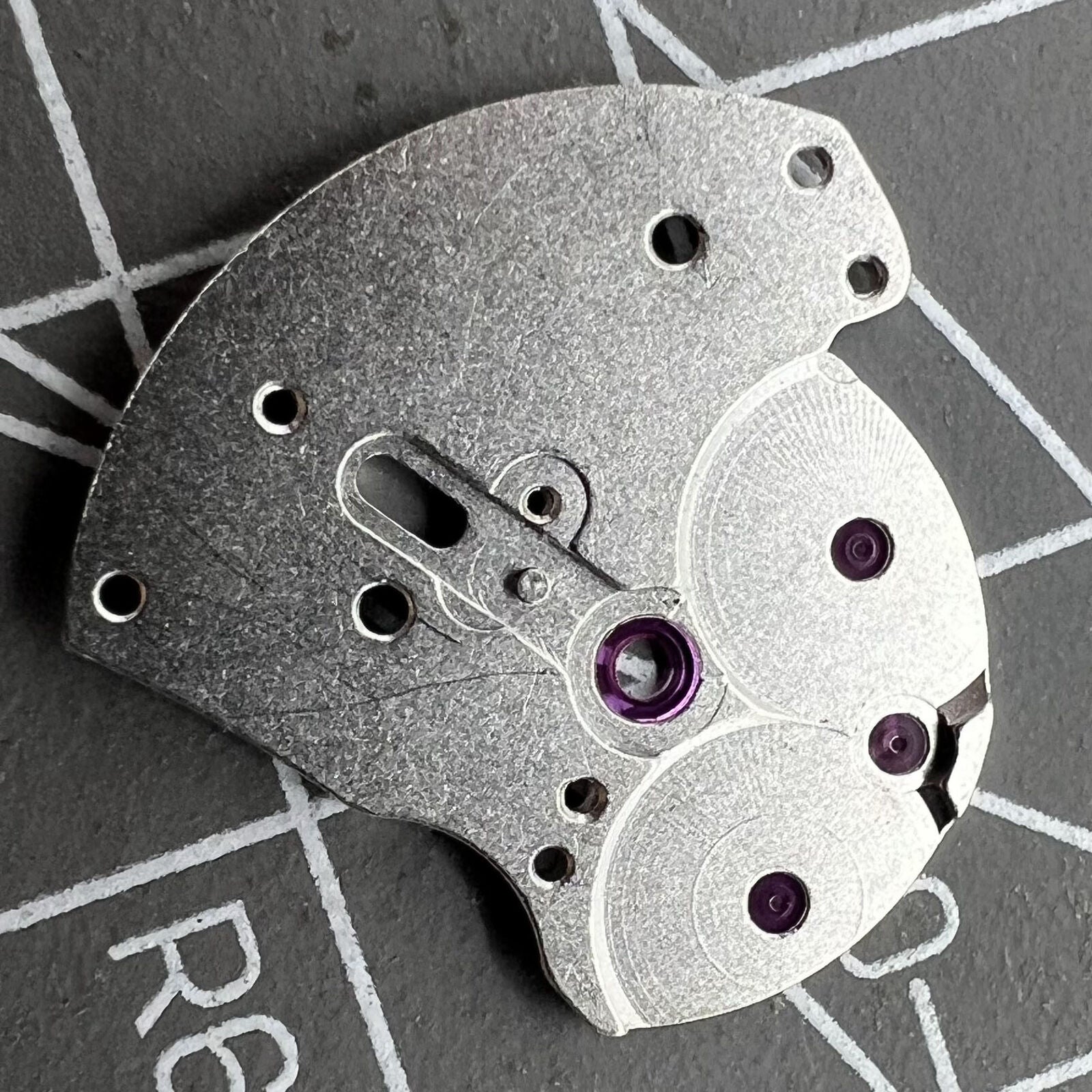 Automatic main wheel bridge with jewels for 3135 movement, high-quality generic watch part for precise repairs.