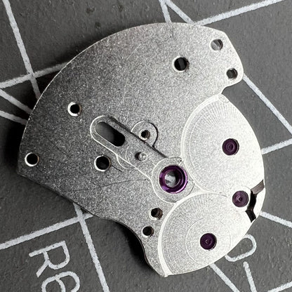 Automatic main wheel bridge with jewels for 3135 movement, high-quality generic watch part for precise repairs.