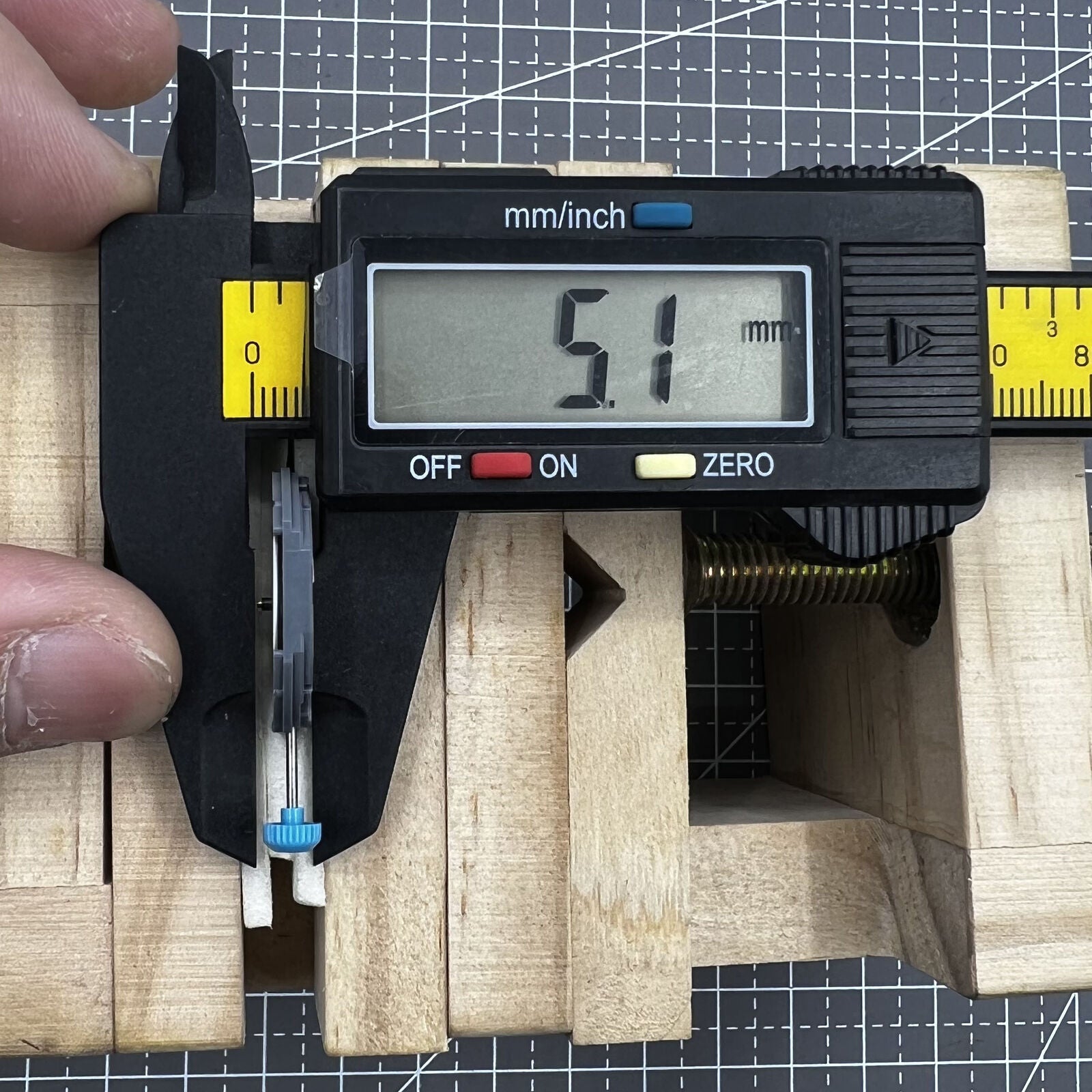 Miyota 6M53 quartz watch movement showcasing big date at 3 o'clock, precise three-hand timekeeping.