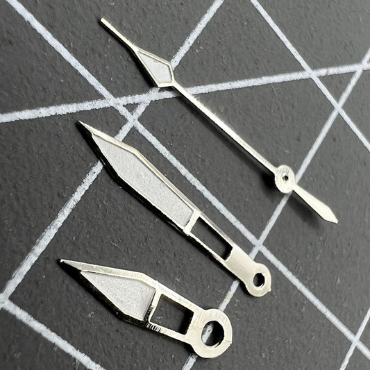 Lume arrow-shaped watch hands by P1 for Miyota 2035 quartz movement, enhancing dial visibility.