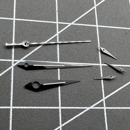 Polished black luminous watch hands set for Ronda 5040B, improving readability in low light,.