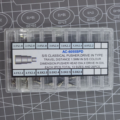 Classic stainless steel chronograph button set with 26 screw-in pushers for watch repair and customization.