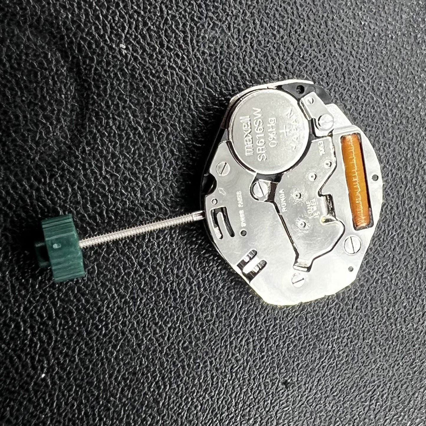 Ronda 1063 Quartz watch movement with three hands, precise timekeeping for elegant accessories.
