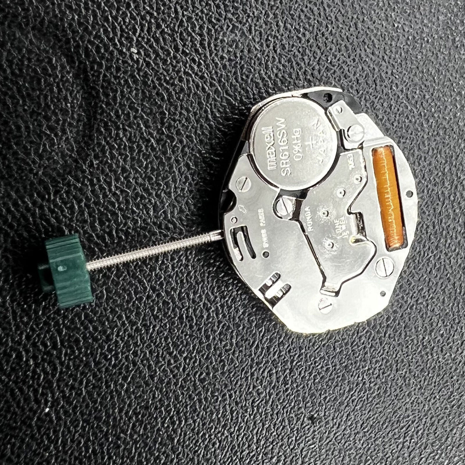 Ronda 1063 Quartz watch movement with three hands, precise timekeeping for elegant accessories.