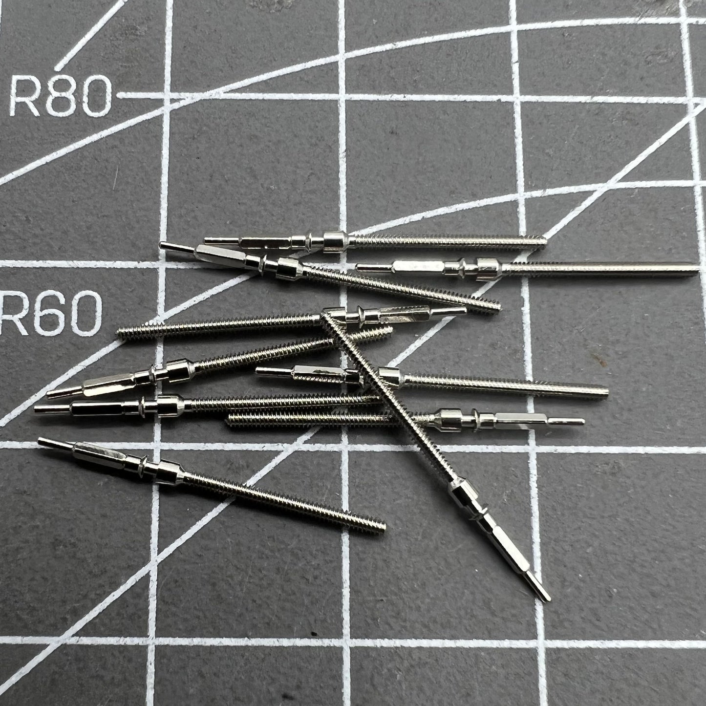 Generic watch winding stem for Shanghai 7120 movement, compatible with various watch models.