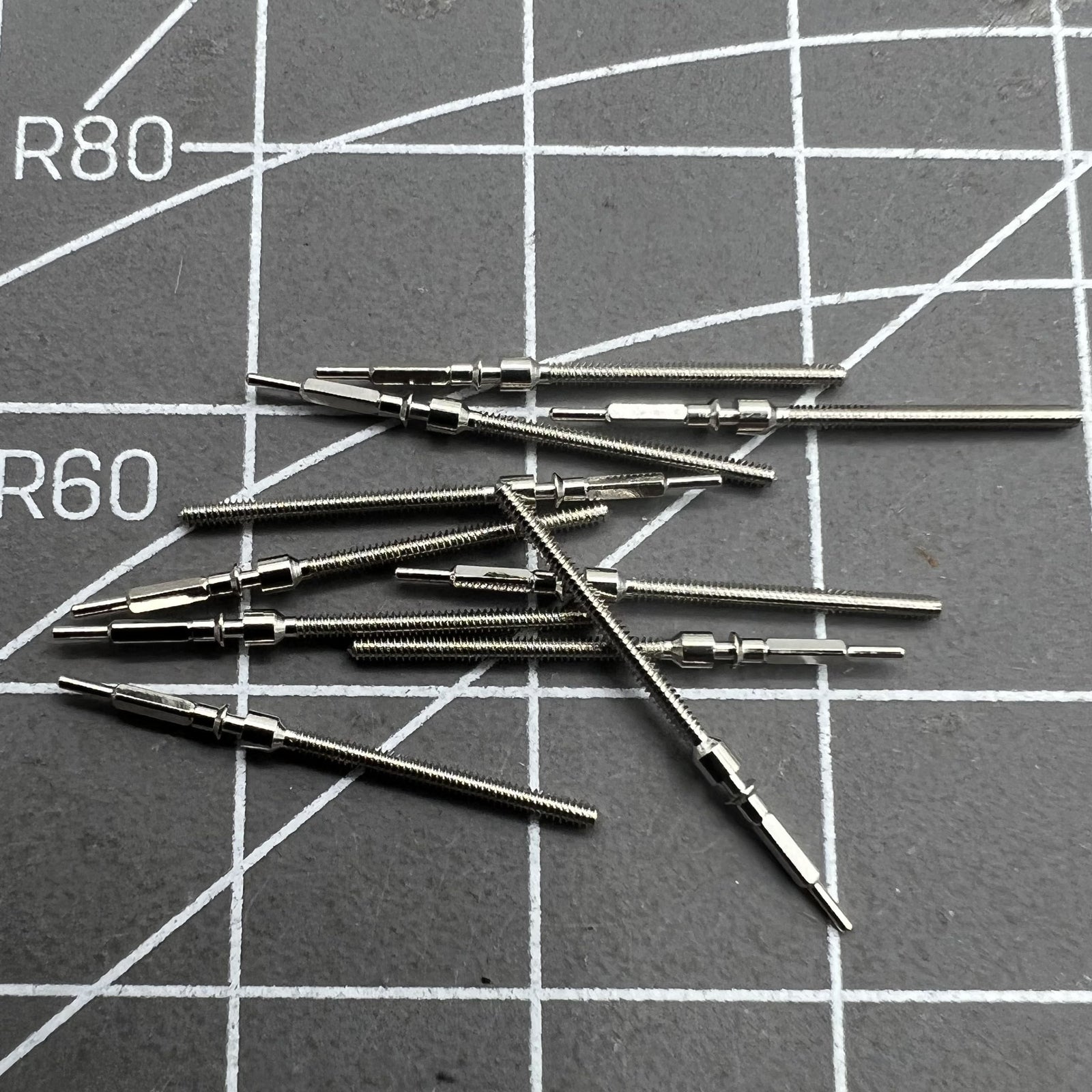 Generic watch winding stem for Shanghai 7120 movement, compatible with various watch models.