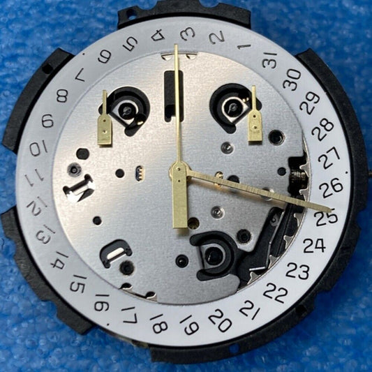 Swiss White ETA G10.212 quartz watch movement with 3 hands and slanted date at 4 o?clock for precise timekeeping.