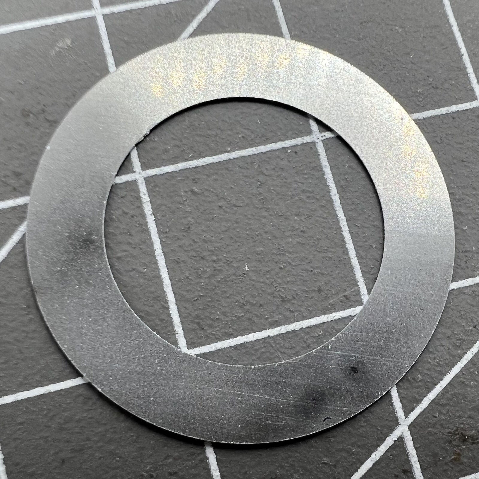 Wide brim white date wheel overlay by ETA for 2836 movement with date display at 3 o'clock position.