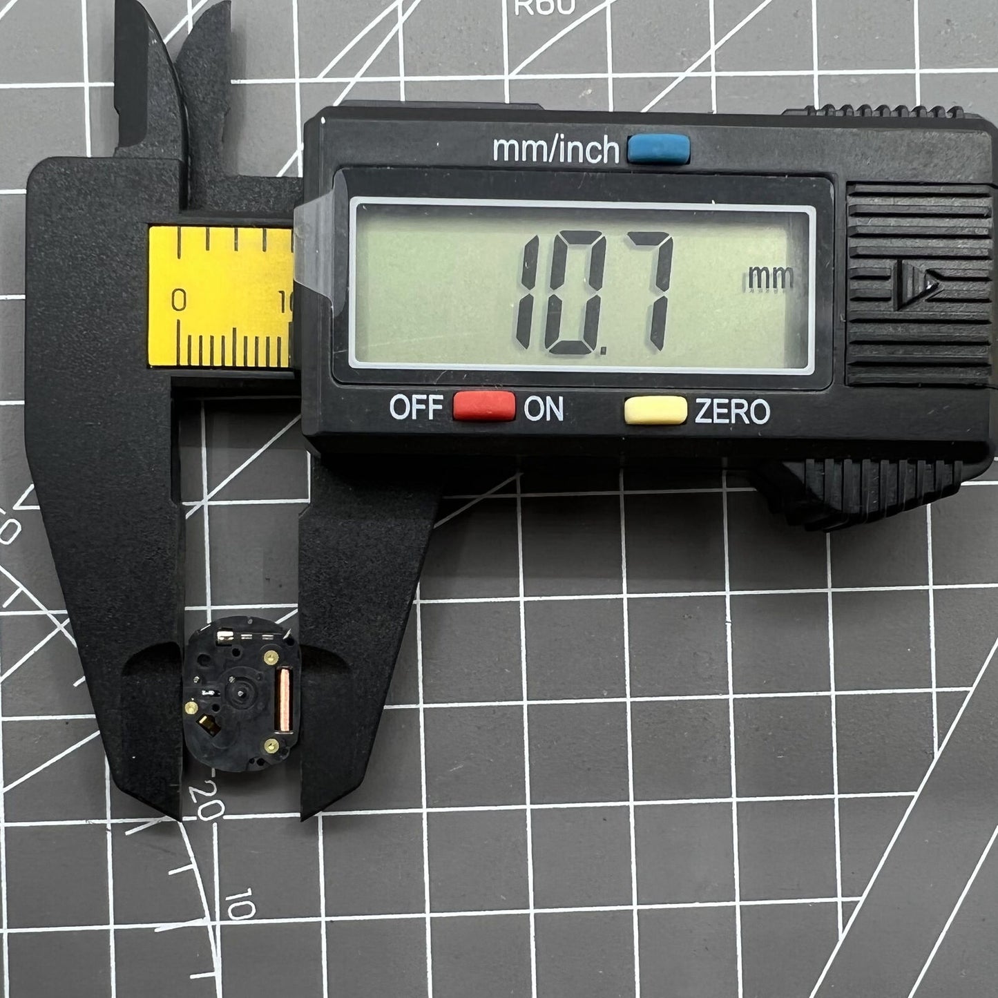 Hattori Epson VX00A quartz watch movement, precise Japan-made part for watch accessory repairs.