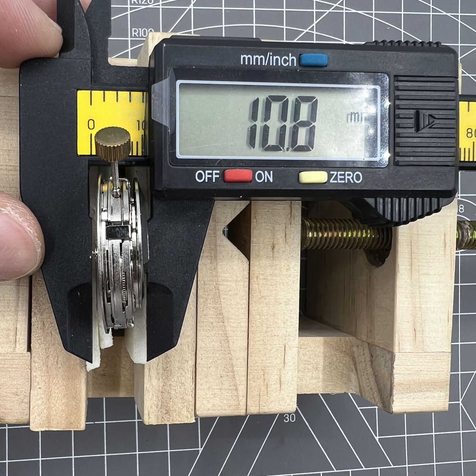 Dandong 7751 automatic watch movement displaying multifunctional time features with 8 hands for precise chronograph functions.
